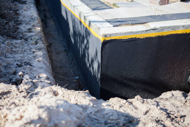 Professional Exterior Waterproofing technician working in Honeoye, NY